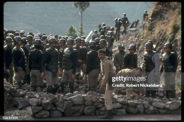 Riot police poised, at ready to halt attempted Jammu & Kashmir Liberation Front protest march to LOC bordering Pakistani Kashmir & Indian Kashmir,...