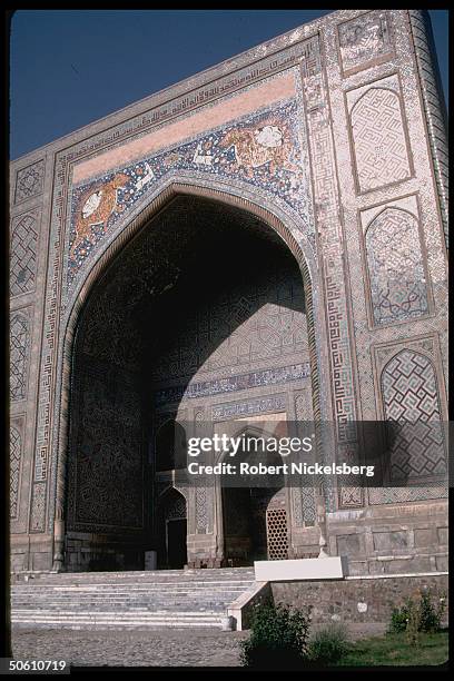 Ornately mosaic facade of main mosque in Samarkand, Uzbekistan.