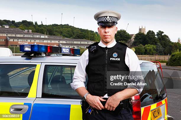 portrait of police - male police officer stock pictures, royalty-free photos & images