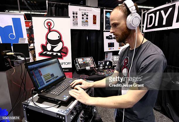 Convention goer experiences the exhibits at the at the 2016 NAMM Show Opening Day at the Anaheim Convention Center on January 21, 2016 in Anaheim,...