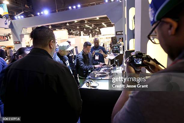 Convention goers experience the exhibits at the at the 2016 NAMM Show Opening Day at the Anaheim Convention Center on January 21, 2016 in Anaheim,...