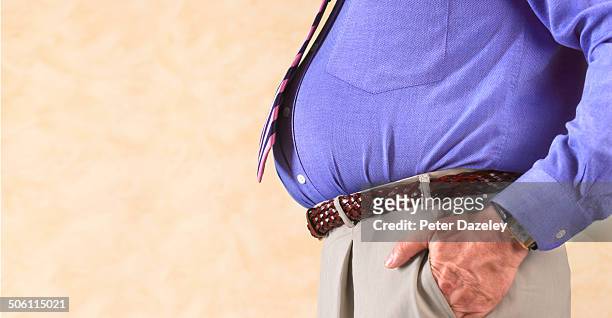 overweight businessman with copy space - fat people stock pictures, royalty-free photos & images