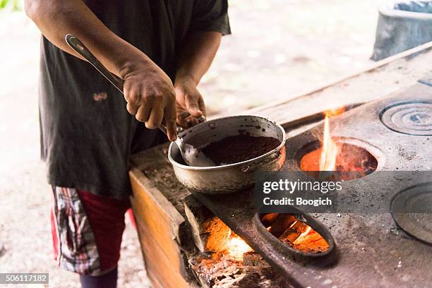 making chocolate from cacao superfood in cahuita costa rica - costa rica stock pictures, royalty-free photos & images