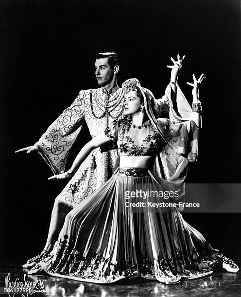 Couple of dancers performing an Indian dance in a Broadway theater in New York city.