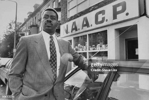 Boston NAACP chief Louis Elisa posing outside organization's HQ. He spoke about his call for city leaders to protect blacks as well as whites in the...