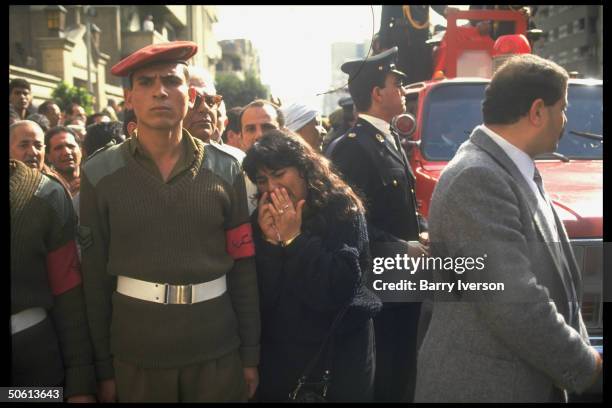 Emoting women amid mourners at funeral for policeman killed in bomb blast by civil defense offices while handling plant bag, re Islamic...