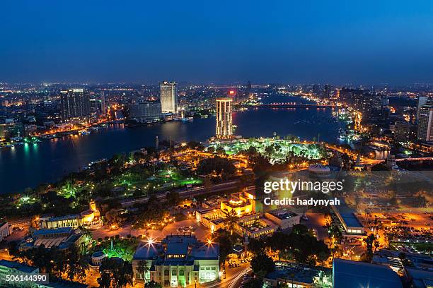 city skyline - cairo at dusk - egypt city stock pictures, royalty-free photos & images