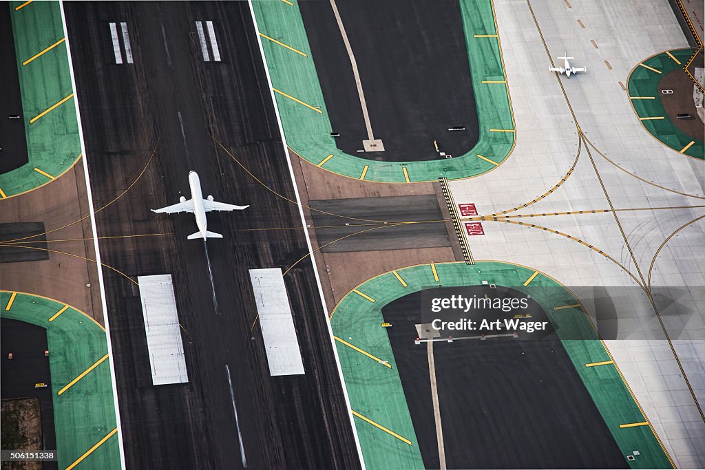 Aerial View of a Passenger Jet on the Runway