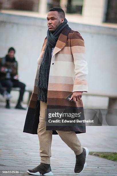 Guest attending the Louis Vuitton show during Paris Fashion Week Menswear Fall Winter 2016/2017 on January 21, 2016 in Paris, France.