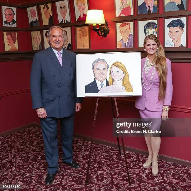 Producers Stewart F. Lane and Bonnie Comley pose with their Sardi's portrait during the unveiling ceremony held at Sardi's on January 21, 2016 in New...