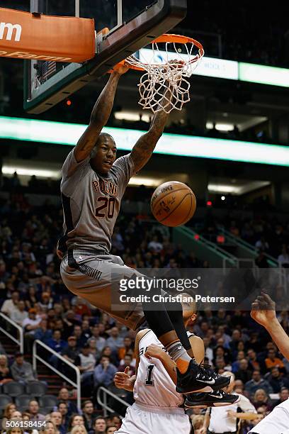 Archie Goodwin of the Phoenix Suns slam dunks the ball against the San Antonio Spurs during the first half of the NBA game at Talking Stick Resort...
