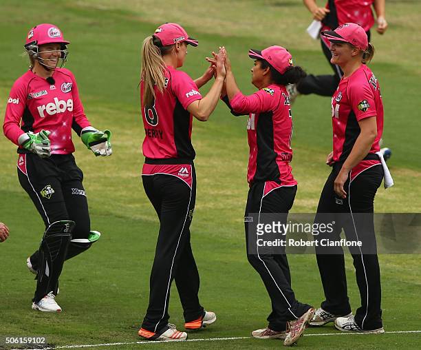 Lisa Sthalekar of the Sixers celebrates after taking the wicket of Heather Knight of the Hurricanes during the Women's Big Bash League Semi Final...
