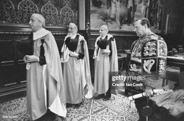 England's Chief Rabbi, Immanuel Jakobovits, the first rabbi to become a Lord & member of Parliament, preparing his borrowed robes for his ennoblement...