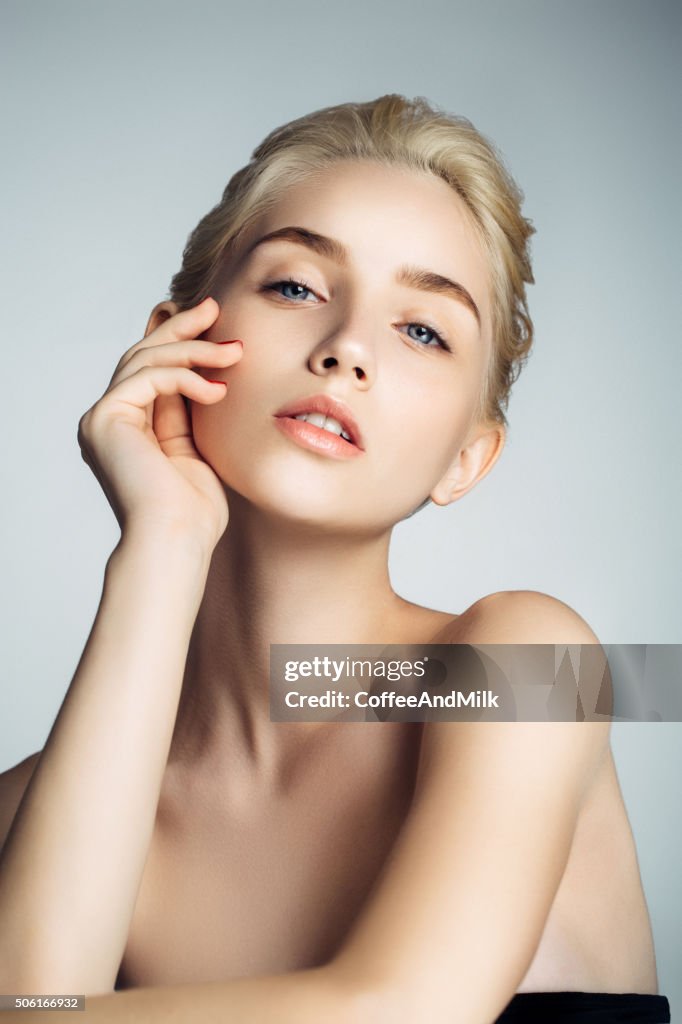 Studio shot of young beautiful woman