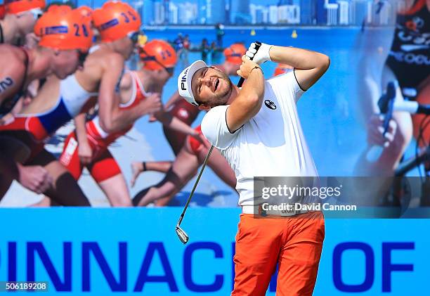 Andy Sullivan of England plays his tee shot at the par 3, 15th hole during the second round of the 2016 Abu Dhabi HSBC Golf Championship at the Abu...