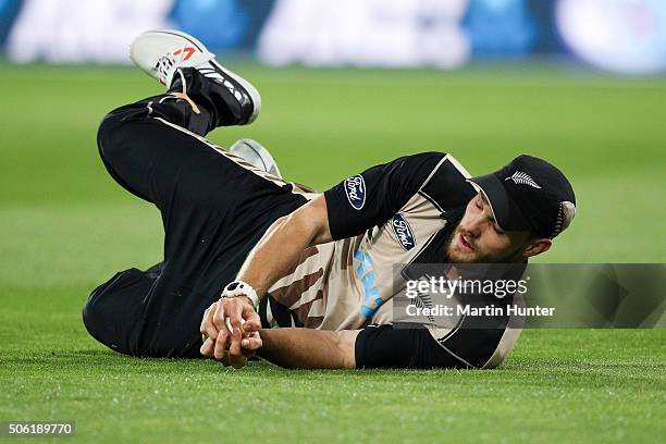 Mitchell McClenaghan of New Zealand holds a catch to dismiss Shoaib Malik of Pakistan during the Twenty20 International match between New Zealand and...