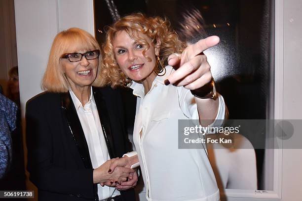 Mireille Darc and Alexandra Bronkers attend the Mireille Darc Photo Exhibition Preview at Artcurial on January 21, 2016 in Paris, France.