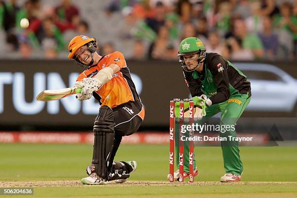 Michael Klinger of the Perth Scorchers hits a ball high into the air and his caught on the boundary line by Marcus Stoinis of the Melbourne Stars...