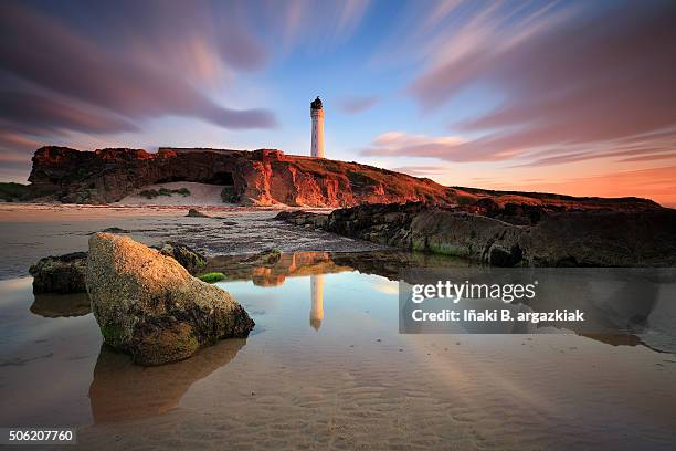 great sunset in the sea-light of lossiemouth - scotland beach stock pictures, royalty-free photos & images