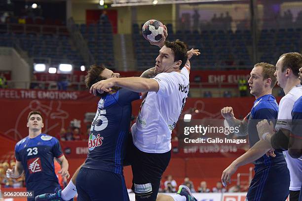 Barys Pukhouski of Belarus during the 1 group match of the EHF European Men's Handball Championship between France and Belarus at Tauron Arena on...