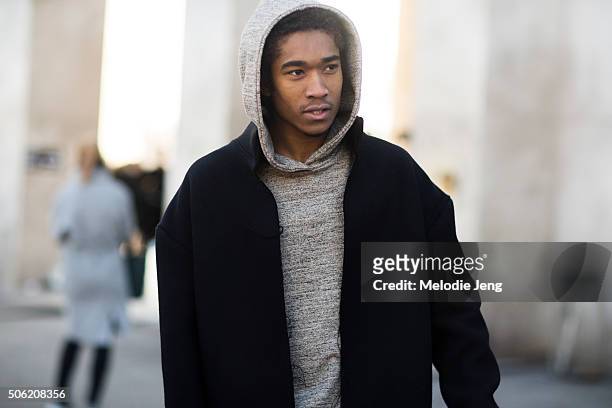 Designer Anthony Calydon wears Nobless Couture gray hoodie, black jacket, denim jeans, and Chelsea boots on January 21, 2016 in Paris, France.