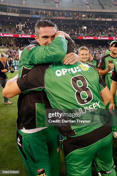 Kevin Pietersen and David Hussey of the Melbourne Stars embrace after winning the Big Bash League Semi Final match against the Perth Scorchers at...