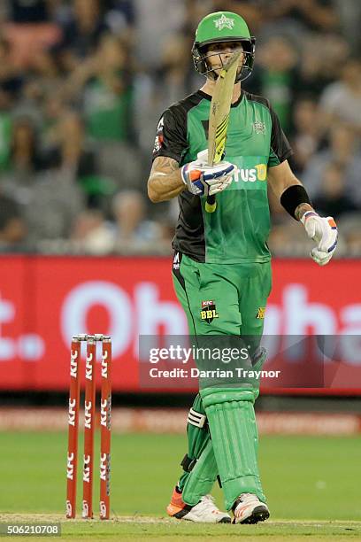 Kevin Pietersen of the Melbourne Stars raises his bat after scoring 50 runs during the Big Bash League Semi Final match between the Melbourne Stars...
