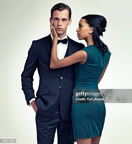 she's a sucker for a man in a suit - black tie party fancy stock pictures, royalty-free photos & images