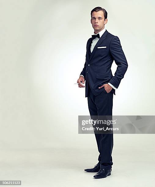 gentleman and his cigarette - men's formalwear stock pictures, royalty-free photos & images