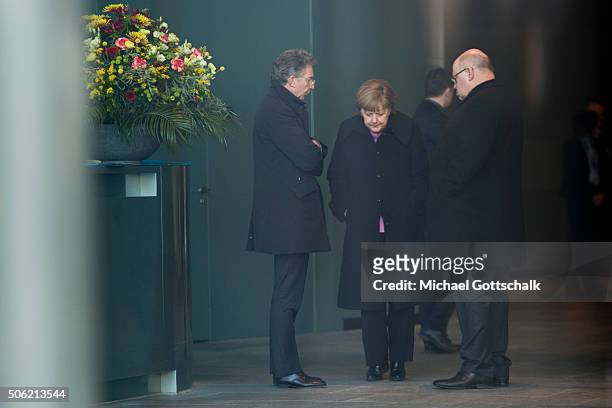 German Chancellor Angela Merkel, Merkels adviser Christoph Heusgen and Head of the German Chancellery Peter Altmaier wait for Turkish Prime Minister...