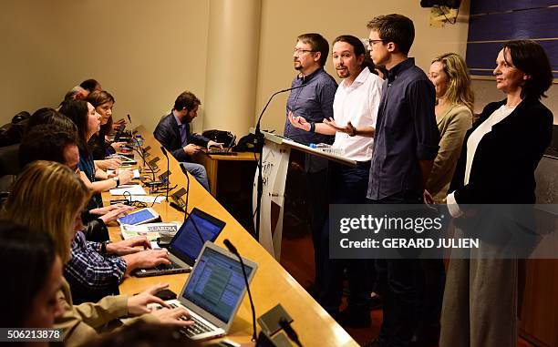 Members of left-wing political party Podemos, Carolina Bescansa, Victoria Rosell, Inigo Errejon, and Pablo Iglesias and Xavi Domenech give a press...