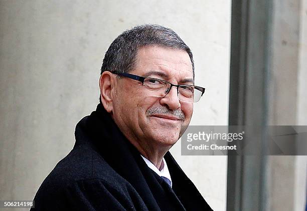 Tunisian Prime Minister Habib Essid poses prior to a meeting with French President Francois Hollande at the Elysee Presidential Palace on January 22,...