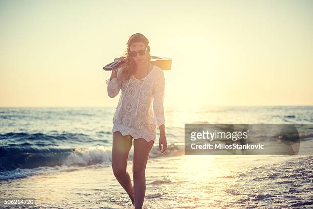 beautifu guitarist at the beach - beach music festival stock pictures, royalty-free photos & images