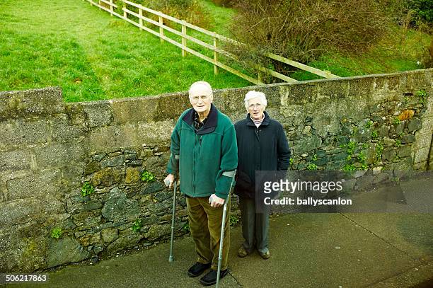 Elderly Couple Looking At Camera.