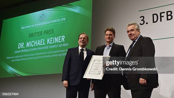 3rd Prize winner of the DFB Science Award Michael Keiner poses with Rainer Koch, Senior Vice President and Peter Frymuth, Vice President Operations...