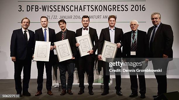 Science Award winner Florian Schultz, Oliver Faude, Christian Strieder and Michael Keiner pose with Rainer Koch, Senior Vice President Deutscher...