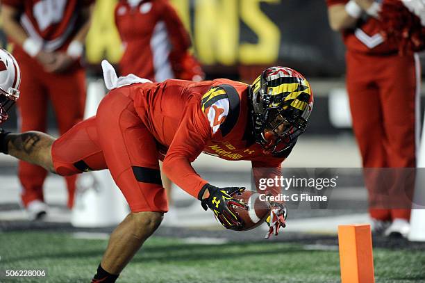 Moore of the Maryland Terrapins catches a touchdown pass against the Wisconsin Badgers at Byrd Stadium on November 7, 2015 in College Park, Maryland.