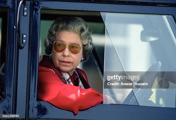Queen Elizabeth ll drives her four wheel drive Land Rover during the Royal Windsor Horse Show on May 16, 1992 in Windsor, England.