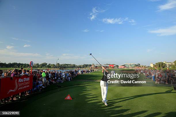 Rory McIlroy of Northern Ireland plays his tee shot at the par 4, 9th hole during the second round of the 2016 Abu Dhabi HSBC Golf Championship at...