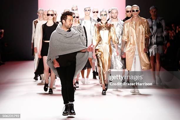 Designer Emre Erdemoglu and models on the runway at the end of the Emre Erdemoglu show during the Mercedes-Benz Fashion Week Berlin Autumn/Winter...
