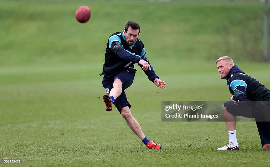 Leicester City Players Receive Carolina Panthers Shirts from the NFL