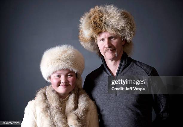 Documentary subject Aisholpan and executive producer Morgan Spurlock from the film "The Eagle Huntress" pose for a portrait during the WireImage...