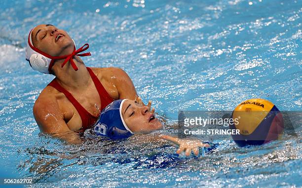 Italy's Roberta Banconi vies for the ball with Spain's Jennifer Pareja during the women's water polo bronze medal match between Spain and Italy at...