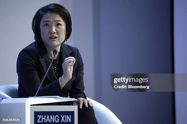 Zhang Xin, billionaire and chief executive officer of Soho China Ltd., speaks during a panel session at the World Economic Forum in Davos,...