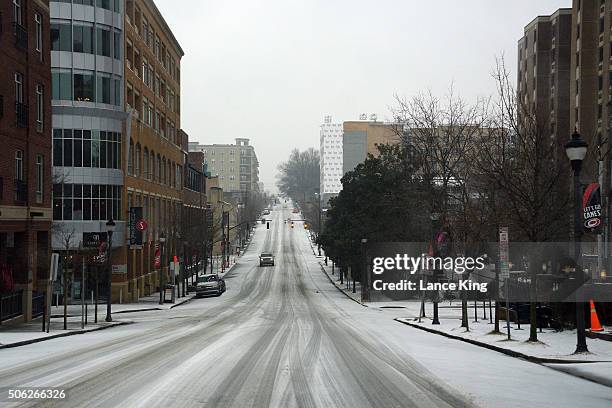 View along Glenwood Avenue during a winter storm on January 22, 2016 in the Glenwood South District of Raleigh, North Carolina. A major snowstorm is...