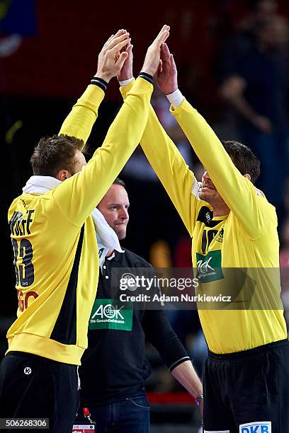 Goalkeeper Carsten Lichtlein from Germany celebrates with his team mate goalkeeper Andreas Wolff from Germany after his save during the Men's EHF...