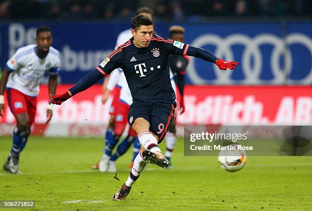 Robert Lewandowski of Bayern Munich scores their first goal from the penalty spot during the Bundesliga match between Hamburger SV and FC Bayern...