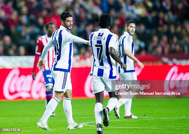 Carlos Vela of Real Sociedad de Futbol celebrates with his teammate Tue Na Bangna Bruma of Real Sociedad de Futbol after scoring the opening goal...