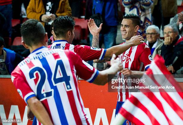 Arnaldo Sanabria of Real Sporting de Gijon celebrates with his teammates Jony Rodriguez of Real Sporting de Gijon after scoring his team's fourth...