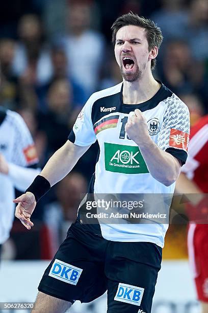 Fabian Wiede of Germany celebrates after scoring during the Men's EHF Handball European Championship 2016 match between Germany and Hungary at...